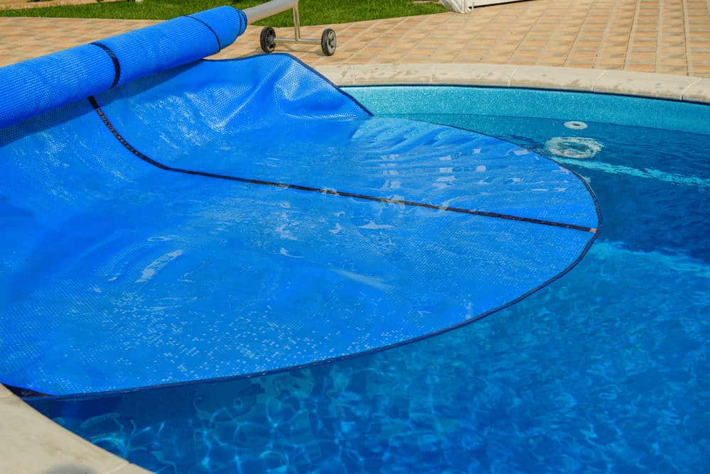 Benefits of using a solar pool cover