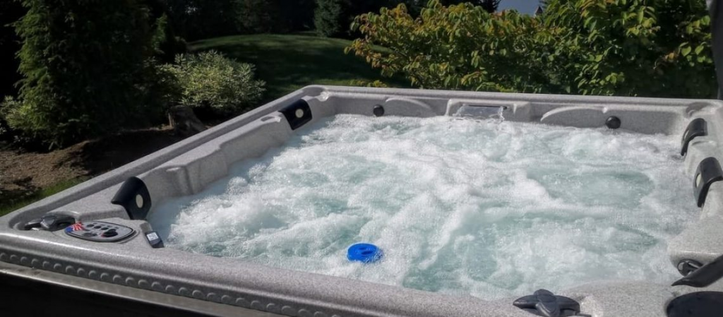 Empty the hot tub every six months