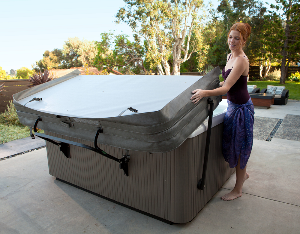 Red-Haired Woman Installing Hot Tub Cover Lifter
