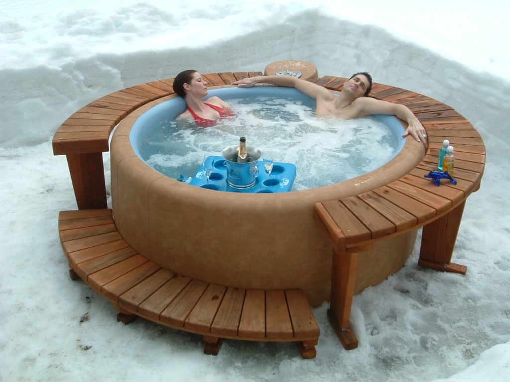 Last but not least is the Coleman SaluSpa Inflatable Hot Tub for fans of terrific air jets. Even though there are only 60 of them, they give a wonderful relaxing massage, which was appreciated even by those owners who were dissatisfied with something else. In addition, this hot tub is quite lightweight, it is easy to move when necessary, and just as easy and fast to install (we recommend watching the video on YouTube, they are more understandable than the instructions). A nice bonus is a high-quality cover that comes with a hot tub. Let's be honest: four people will only fit in this hot tub if you have a very close relationship. However, two people will be quite comfortable and have some personal space left over. As a reminder, for a large number of people, you're better off orienting yourself to the Bestway SaluSpa Santorini HydroJet Inflatable Hot Tub (review). Soft-sided hot tub VS Hard-shell hot tub